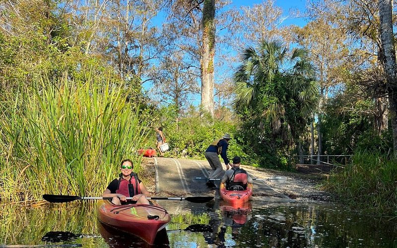 Boat-assisted kayak tour
